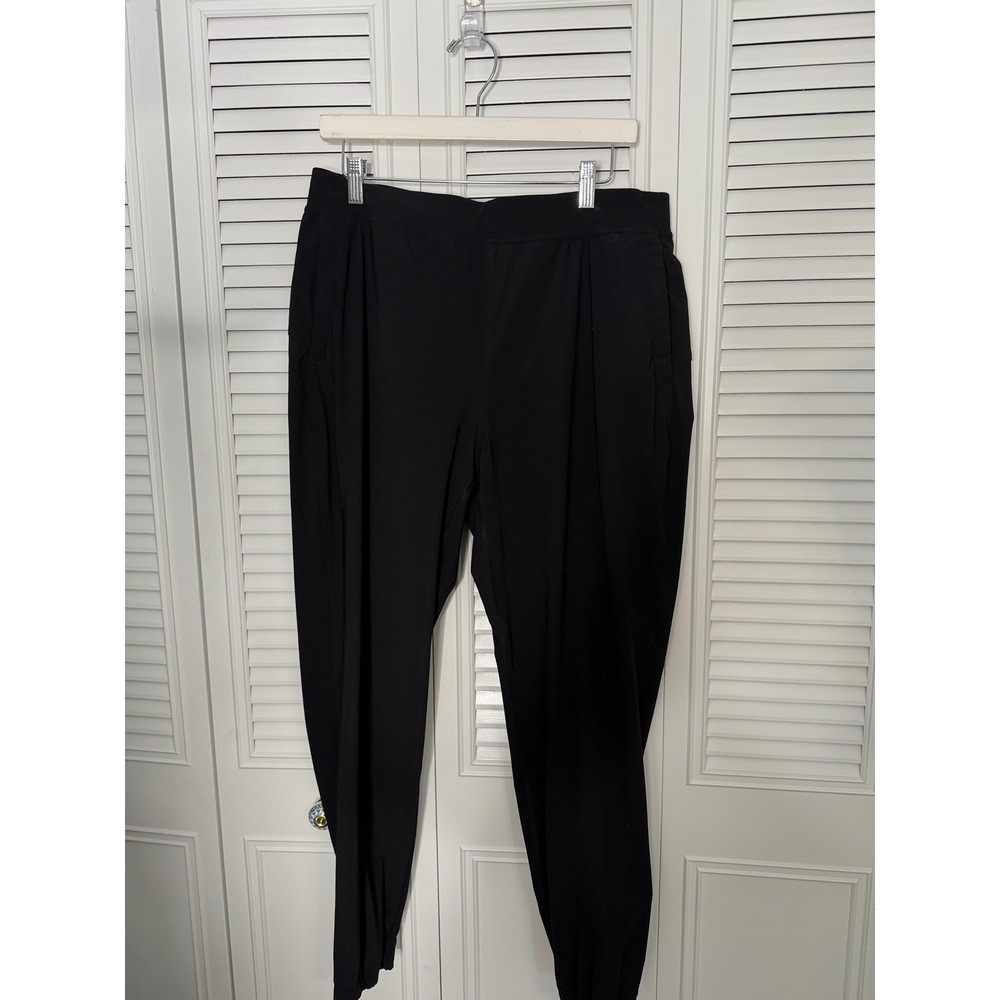 Lululemon Black Tapered Athletic Pants Zip Ankle Pockets Stretch Women's